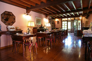 Hoteles rurales de Casonas Asturianas: salón comedor del hotel La Arquera